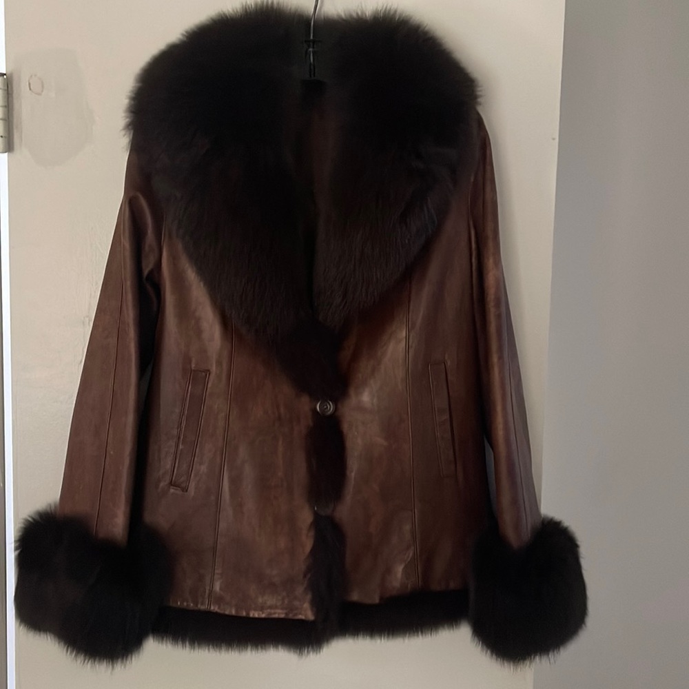 Brown distressed leather jacket.